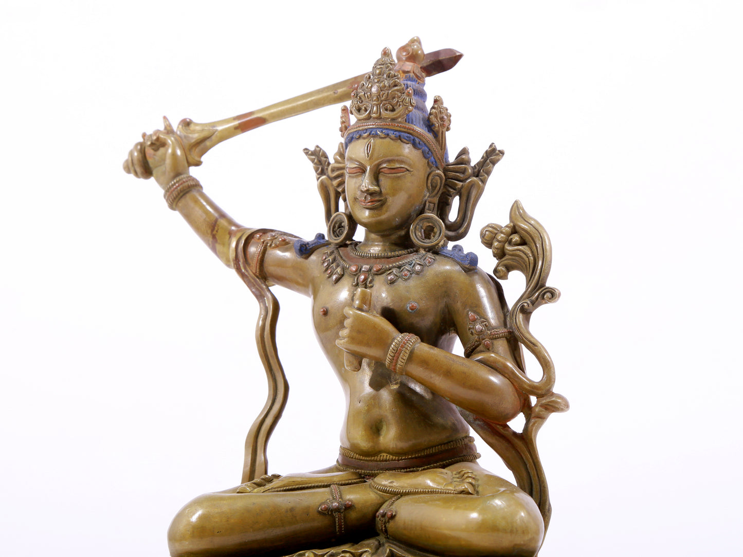 A majestic alloy copper inlaid silver statue of Manjusri Bodhisattva