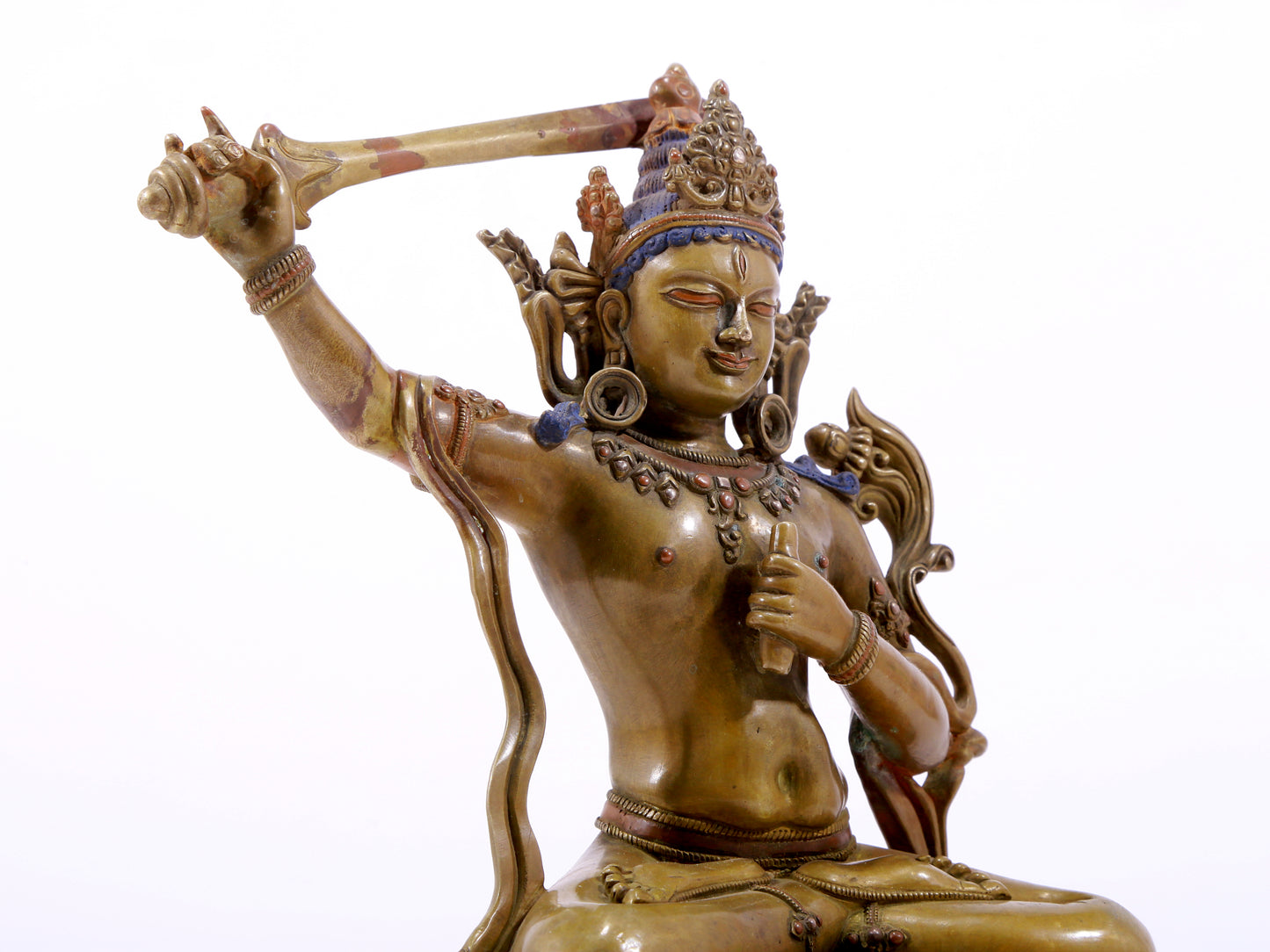 A majestic alloy copper inlaid silver statue of Manjusri Bodhisattva