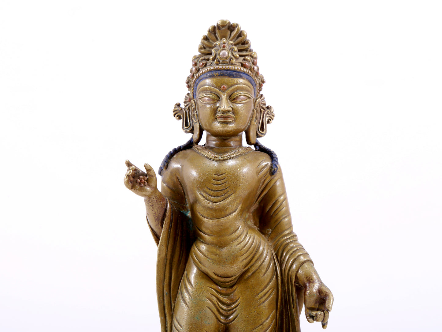 A solemn statue of Bodhisattva made of alloy copper and inlaid with silver