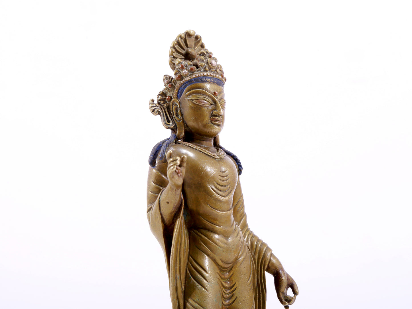 A solemn statue of Bodhisattva made of alloy copper and inlaid with silver