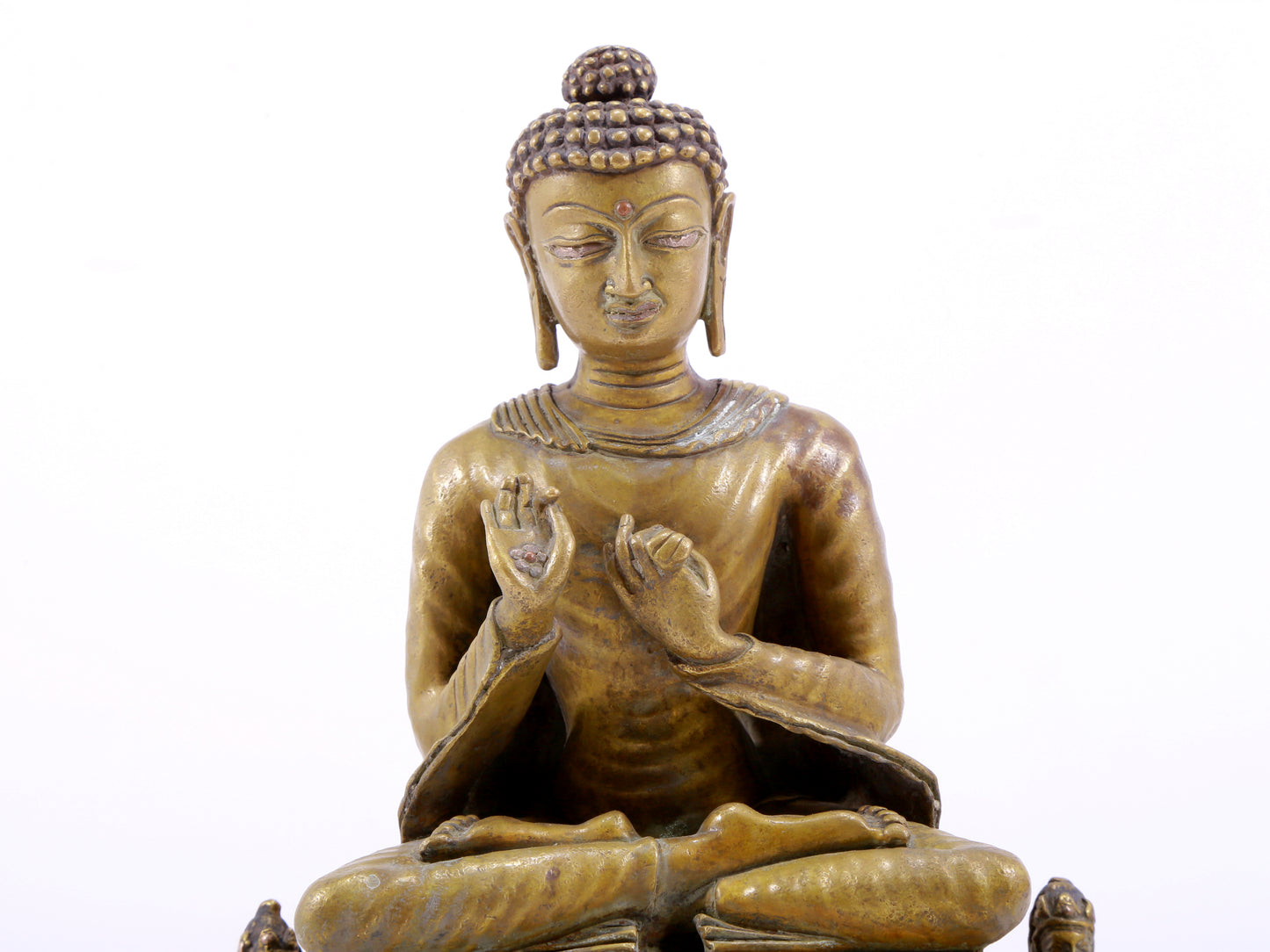 A solemn alloy copper statue of Gautama Buddha