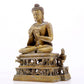 A solemn alloy copper statue of Gautama Buddha