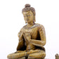 A solemn alloy copper statue of Gautama Buddha