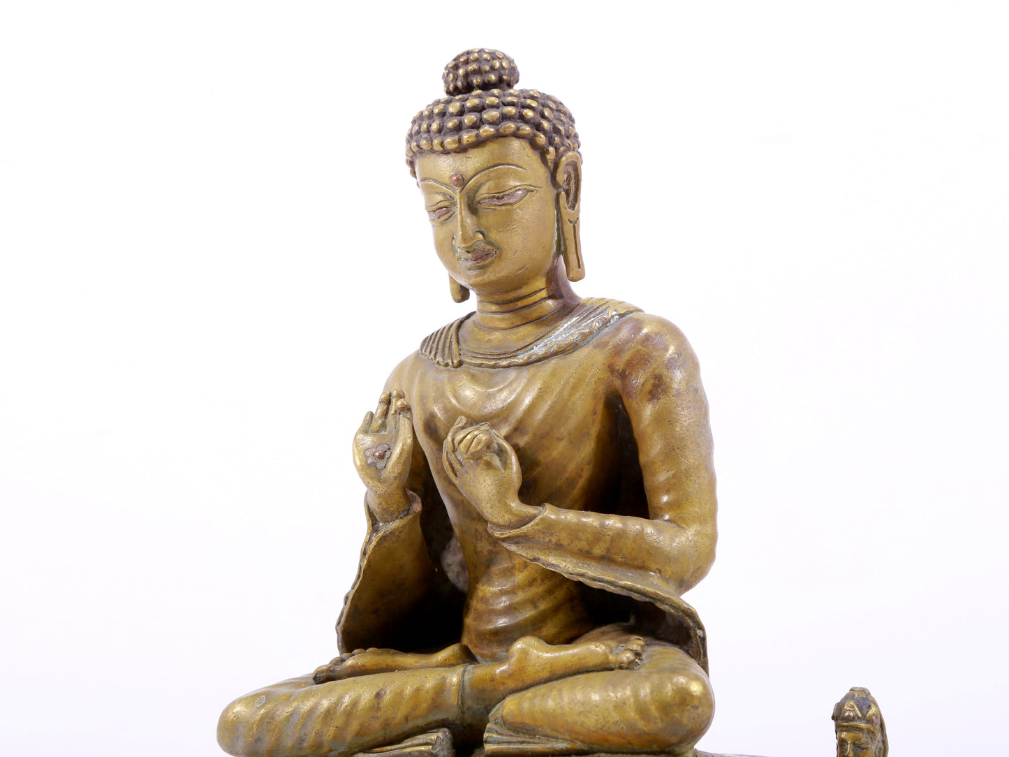 A solemn alloy copper statue of Gautama Buddha