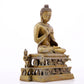 A solemn alloy copper statue of Gautama Buddha