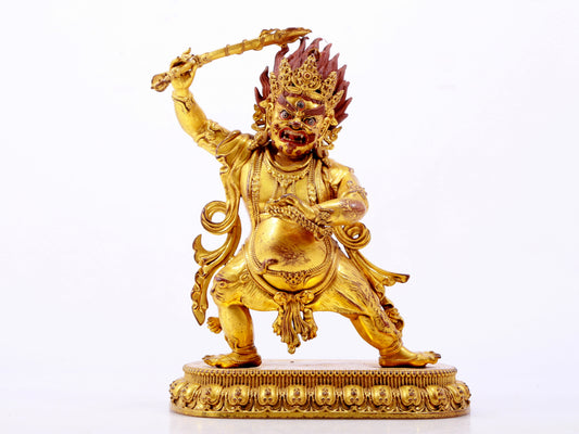 A solemn gilt bronze Vajra statue