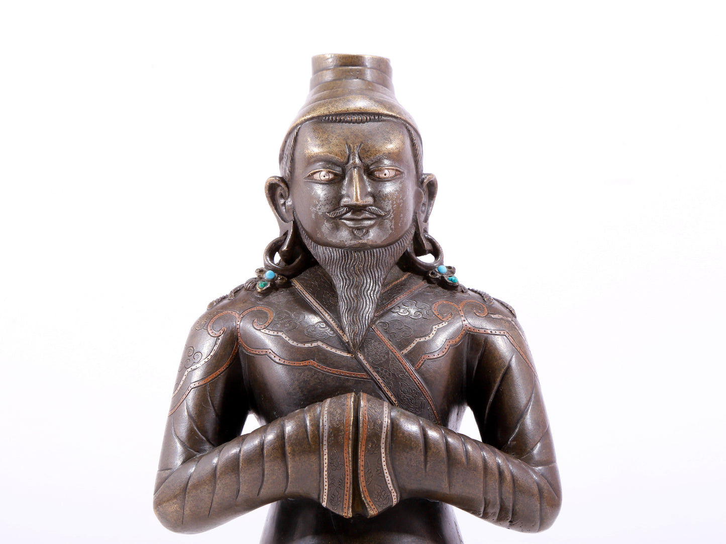 A majestic alloy copper figure inlaid with silver