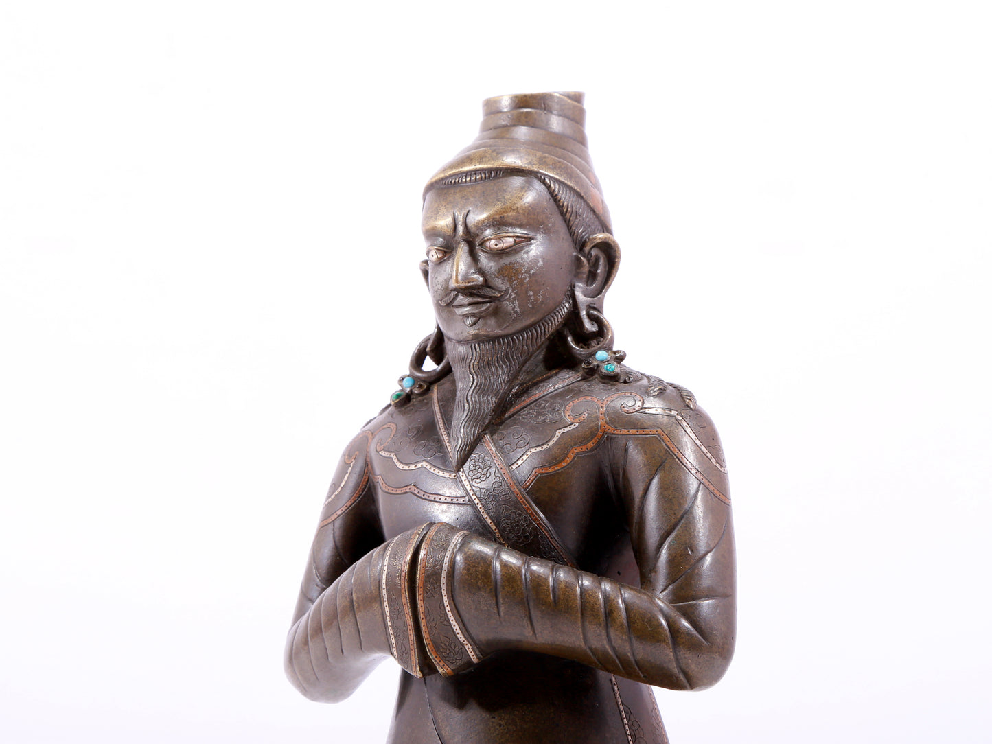 A majestic alloy copper figure inlaid with silver