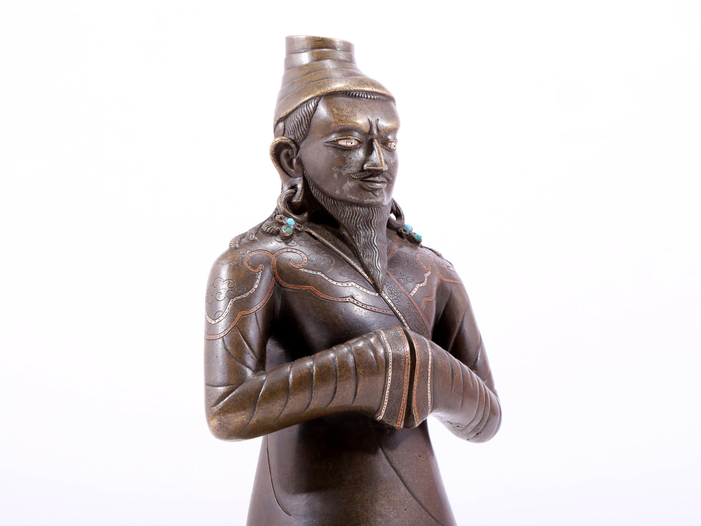 A majestic alloy copper figure inlaid with silver