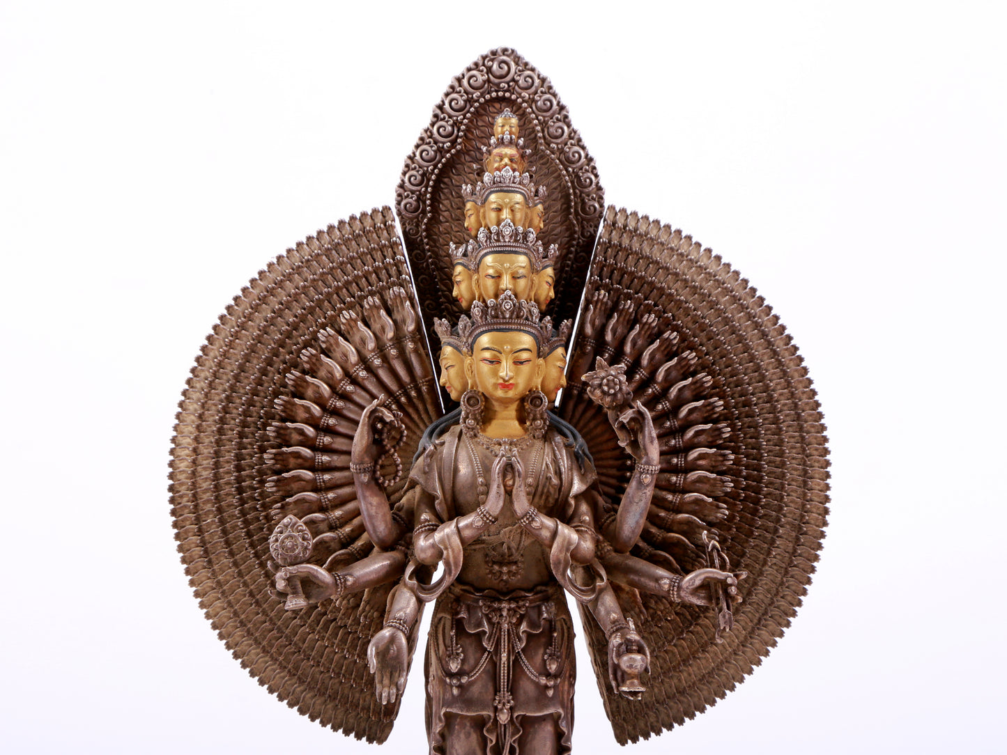 A majestic gilt bronze and silver statue of Avalokitesvara with Thousand Arms