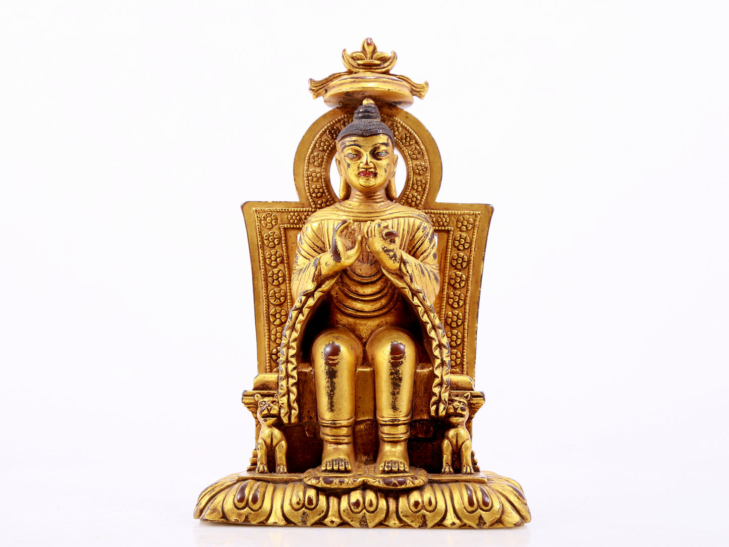 A majestic gilt bronze statue of Sakyamuni