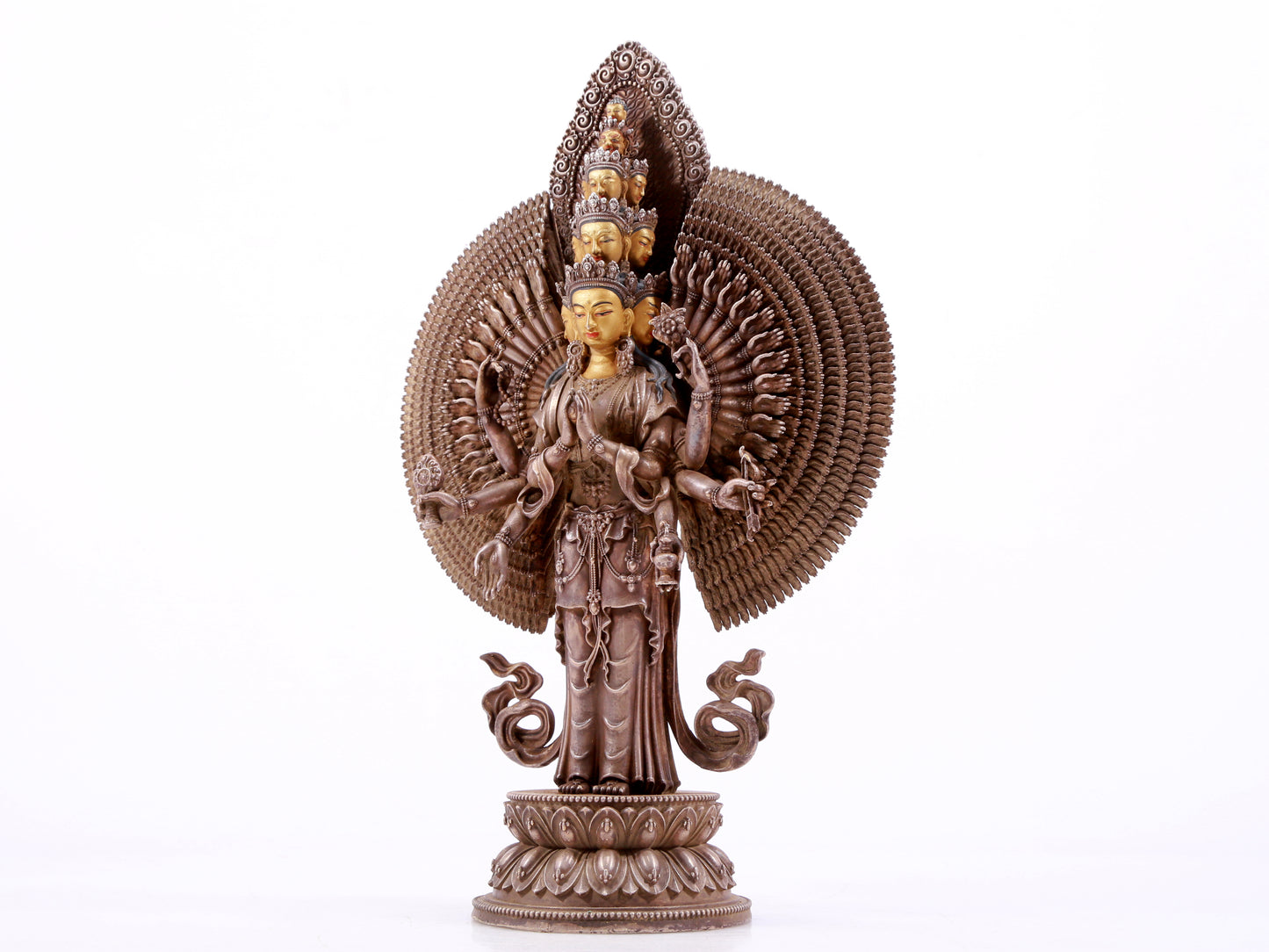 A majestic gilt bronze and silver statue of Avalokitesvara with Thousand Arms