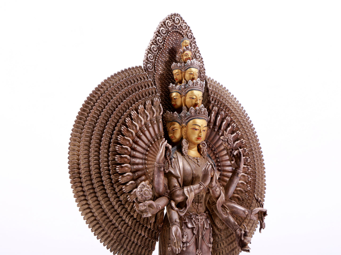 A majestic gilt bronze and silver statue of Avalokitesvara with Thousand Arms