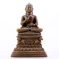 A solemn alloy copper inlaid silver statue of Gautama Buddha