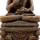 A solemn alloy copper inlaid silver statue of Gautama Buddha