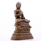 A solemn alloy copper inlaid silver statue of Gautama Buddha