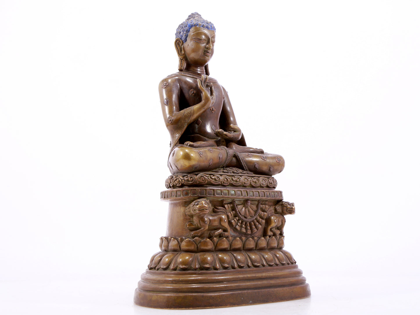 A solemn alloy copper inlaid silver statue of Gautama Buddha