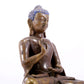 A solemn alloy copper inlaid silver statue of Gautama Buddha