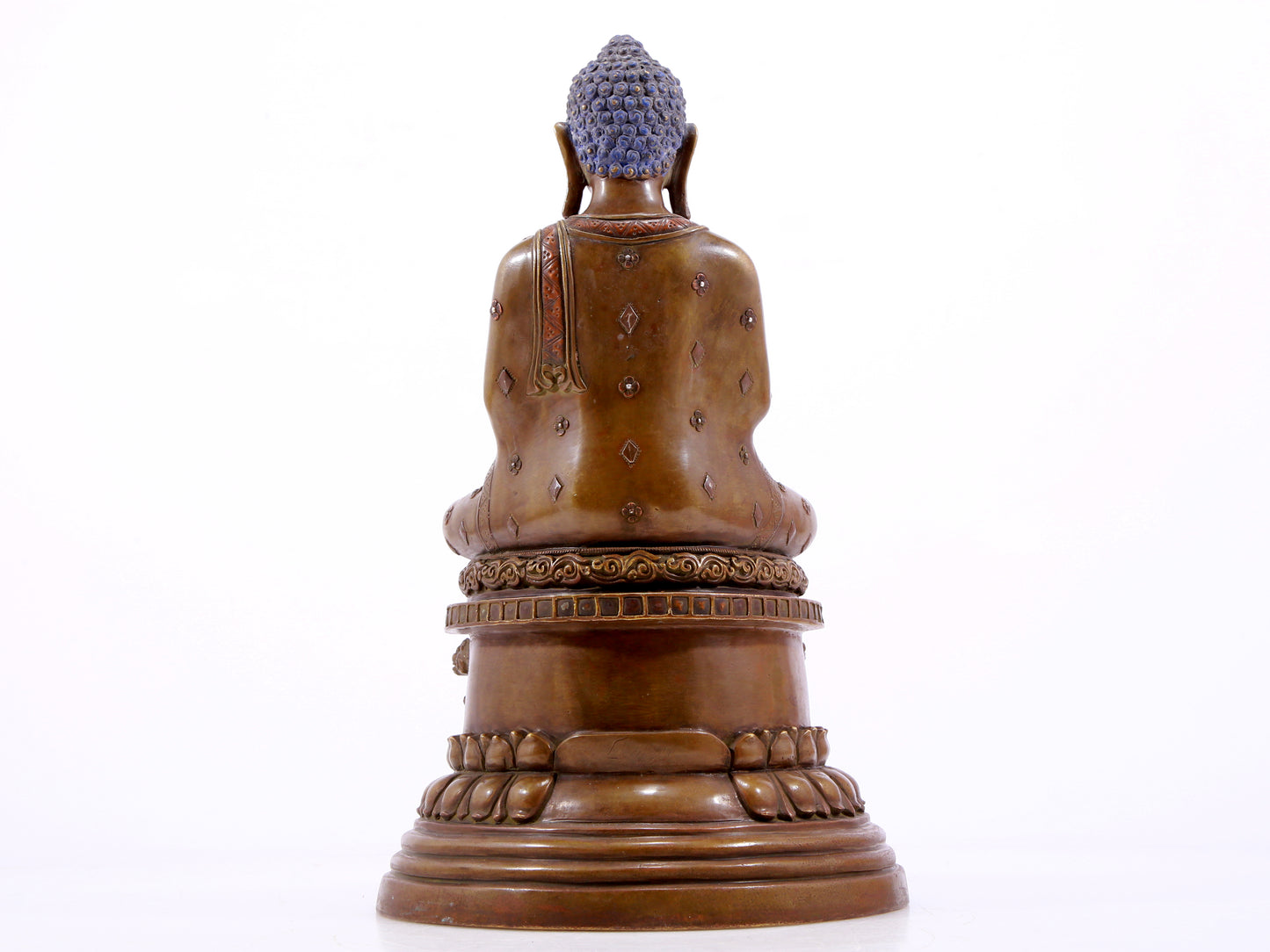 A solemn alloy copper inlaid silver statue of Gautama Buddha