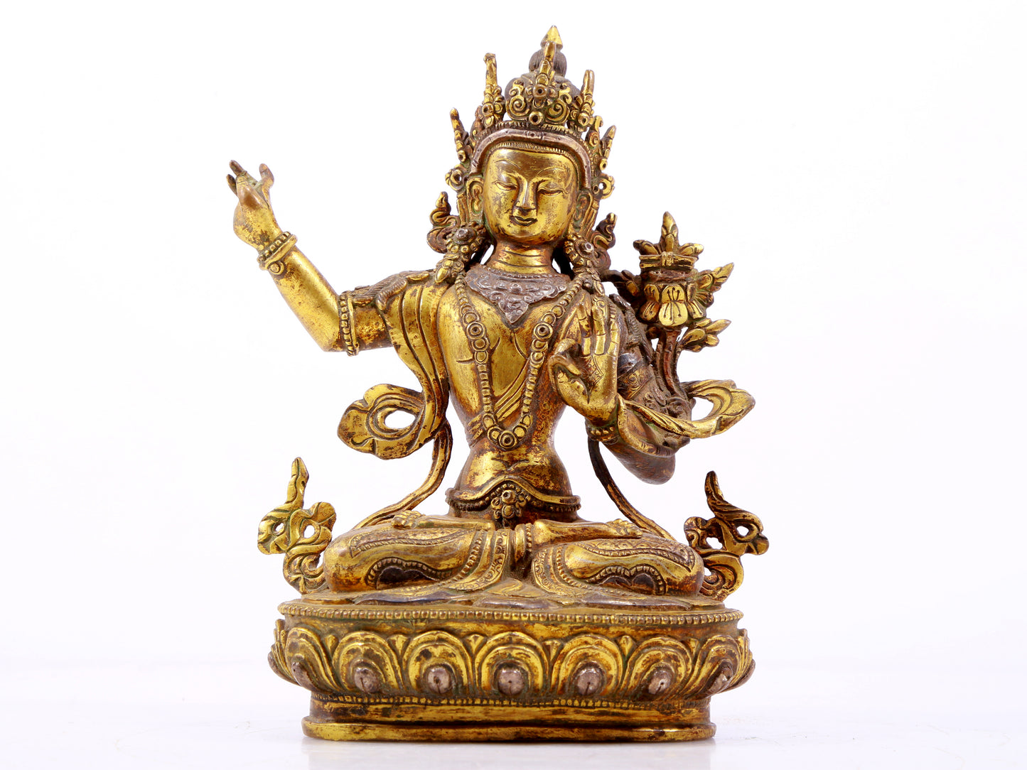 A majestic gilt bronze and silver statue of Tara