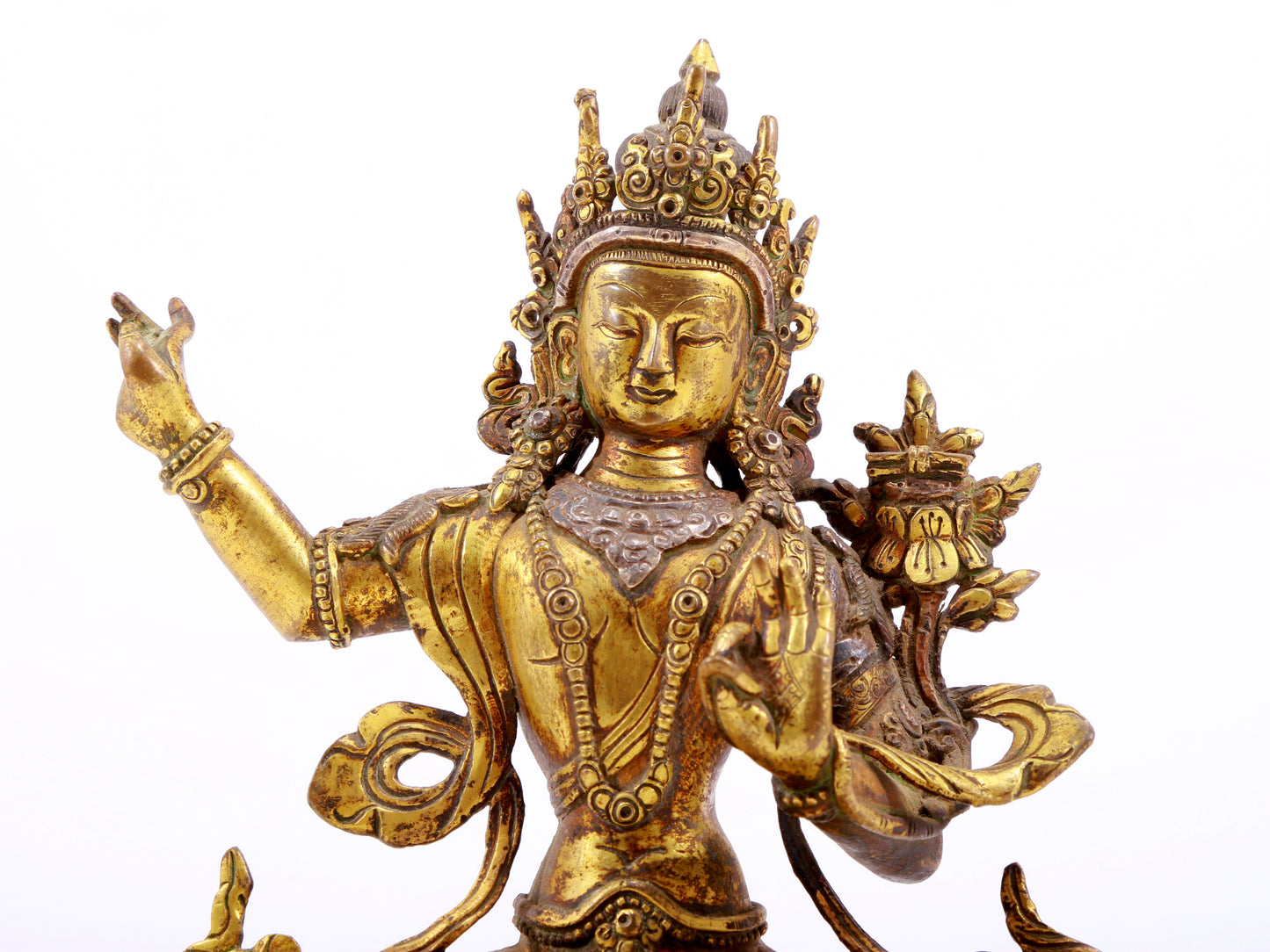 A majestic gilt bronze and silver statue of Tara