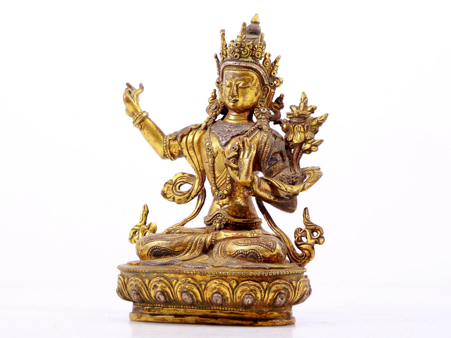 A majestic gilt bronze and silver statue of Tara