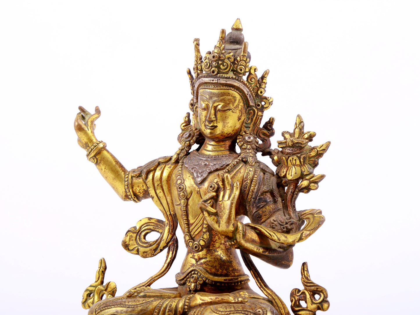 A majestic gilt bronze and silver statue of Tara