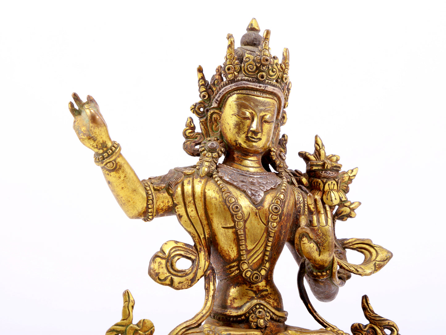 A majestic gilt bronze and silver statue of Tara