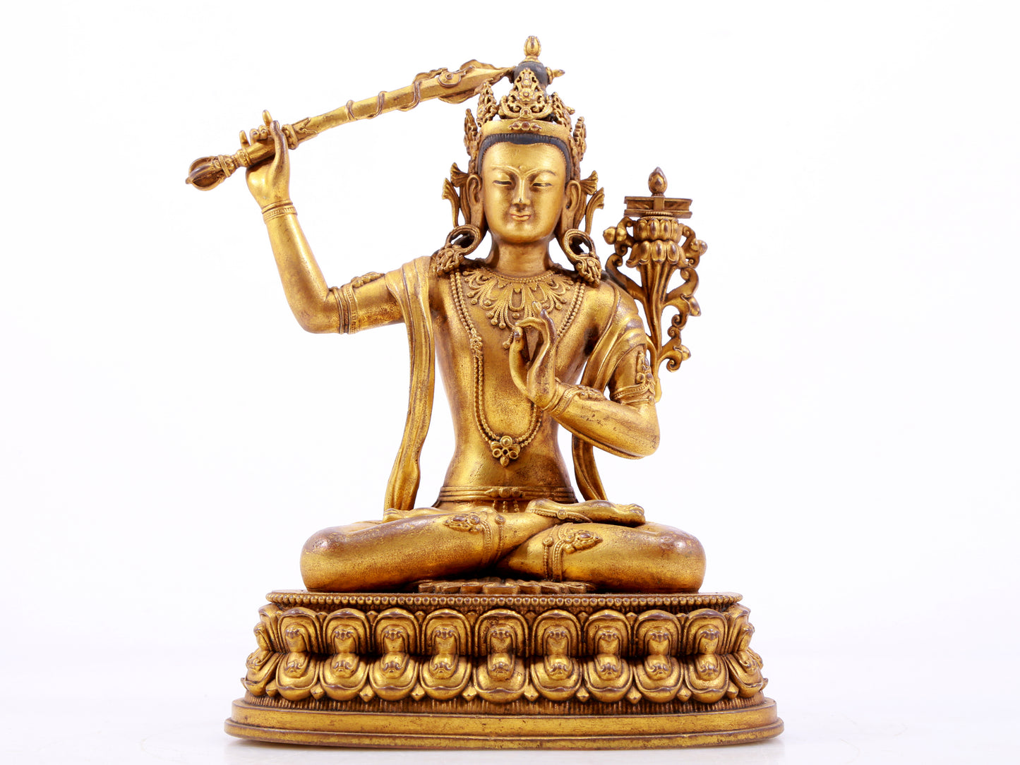 A majestic gilt bronze statue of Manjusri Bodhisattva