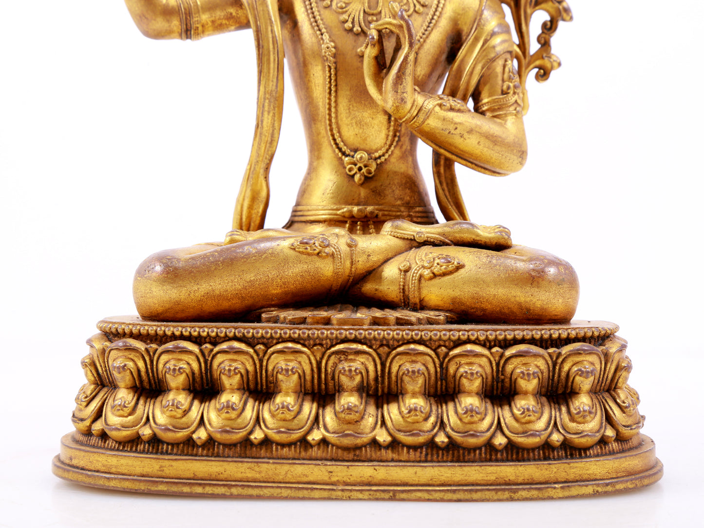 A majestic gilt bronze statue of Manjusri Bodhisattva