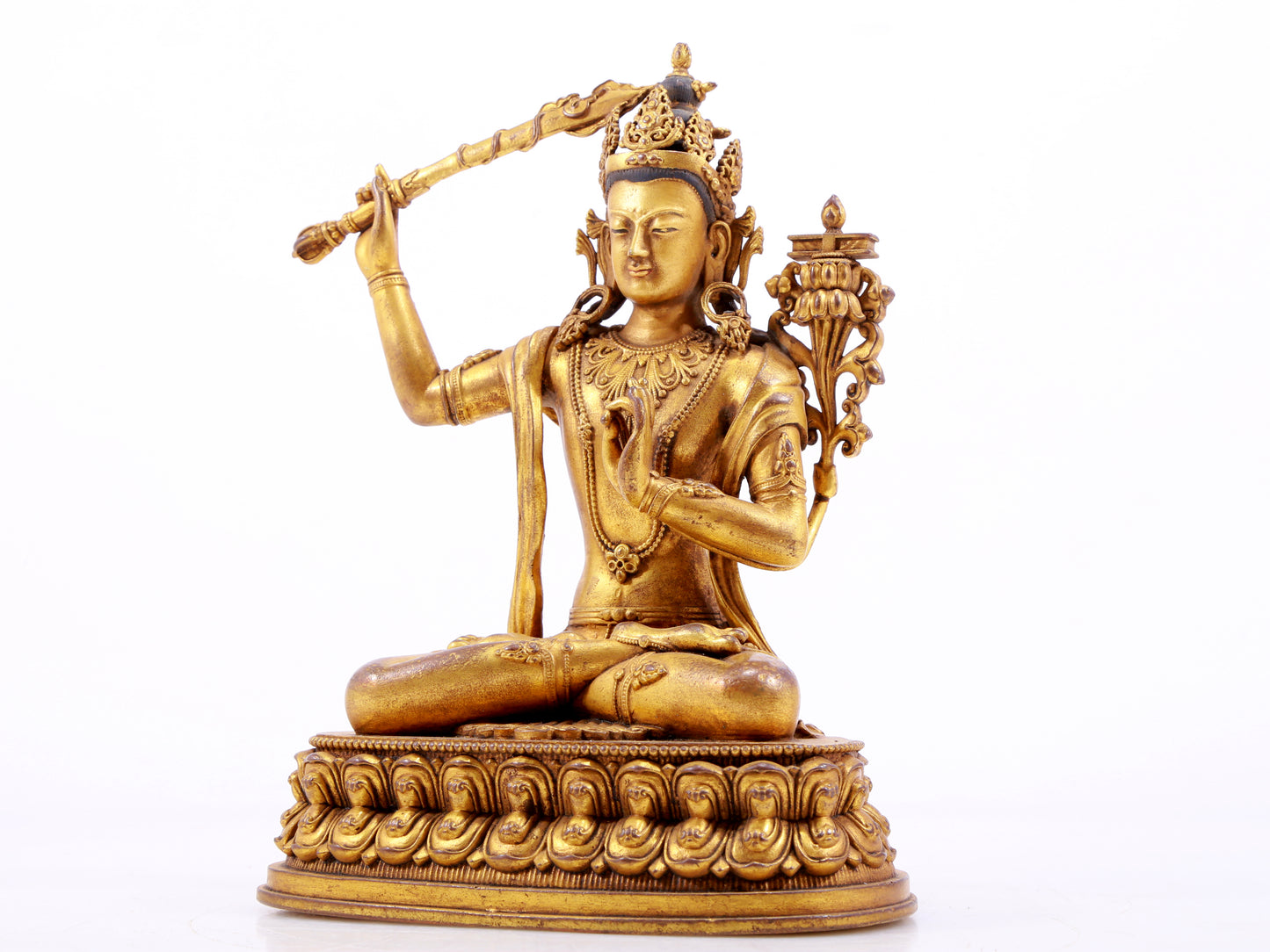 A majestic gilt bronze statue of Manjusri Bodhisattva