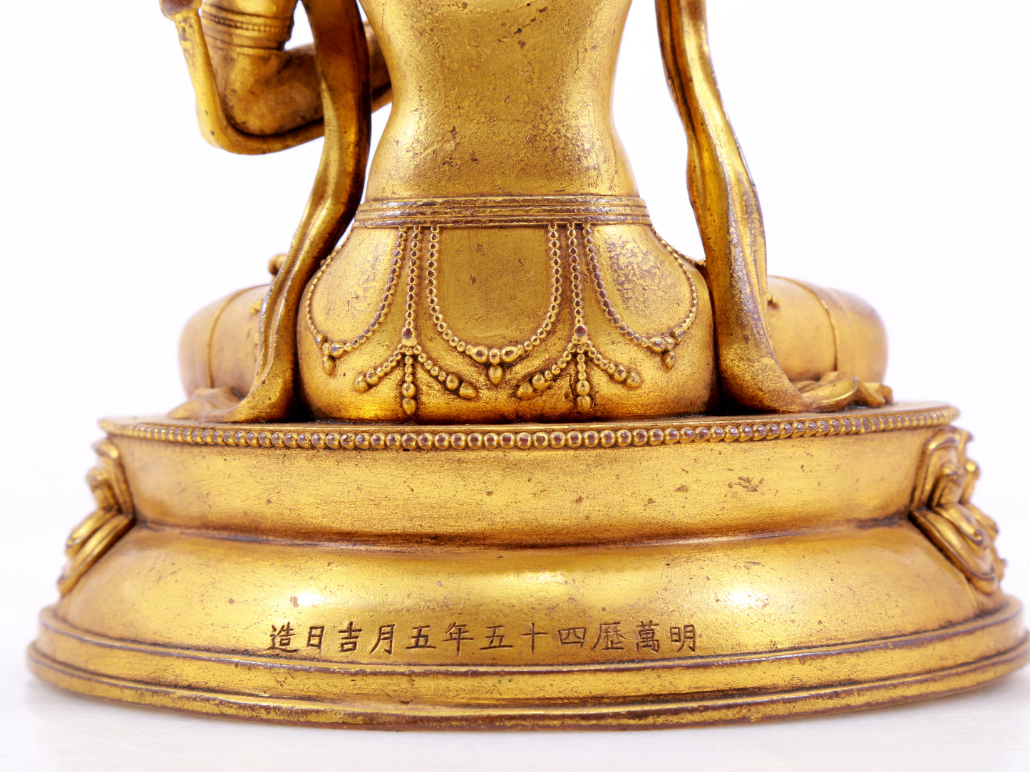 A majestic gilt bronze statue of Manjusri Bodhisattva