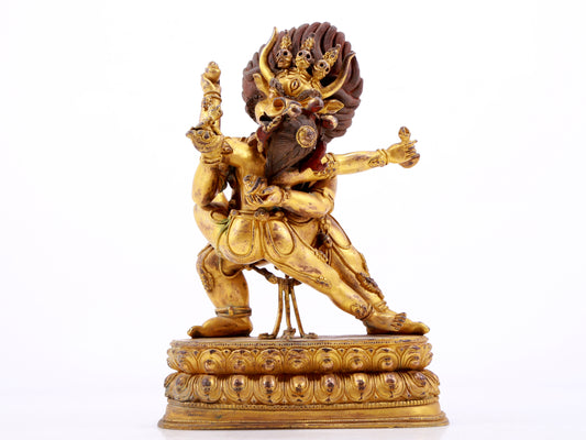 A solemn gilt bronze statue of Yamantaka Vajra