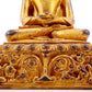 A solemn gilt bronze statue of Bodhisattva