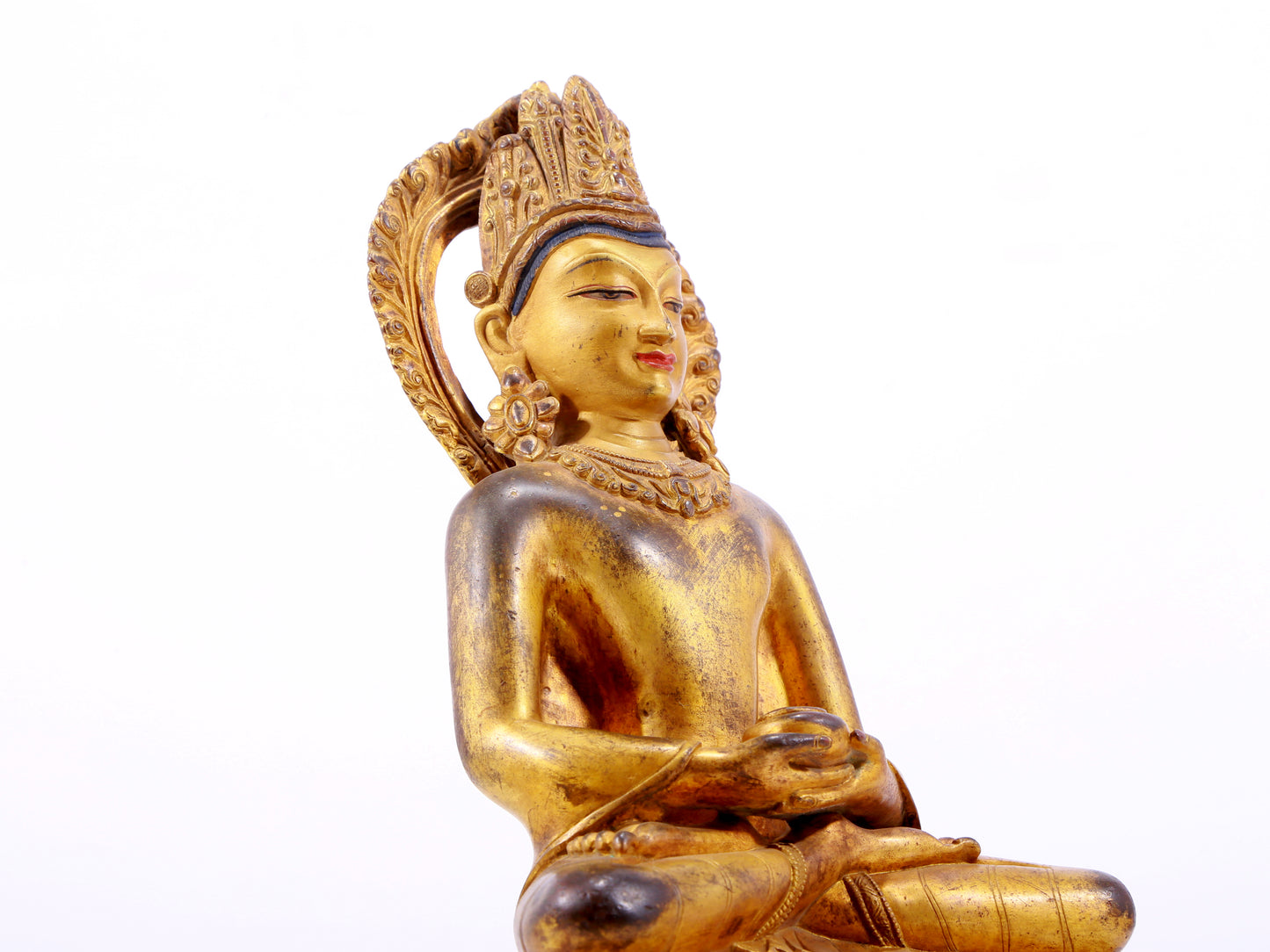 A solemn gilt bronze statue of Bodhisattva