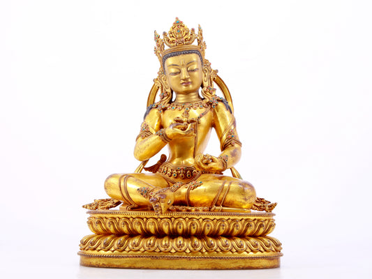 A solemn gilt bronze statue of Vajrasattva inlaid with hundreds of treasures