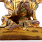 A solemn gilt bronze statue of the Guru