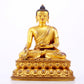 A majestic gilt bronze statue of Sakyamuni