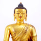 A majestic gilt bronze statue of Sakyamuni