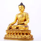 A majestic gilt bronze statue of Sakyamuni