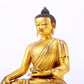 A majestic gilt bronze statue of Sakyamuni