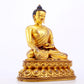 A majestic gilt bronze statue of Sakyamuni