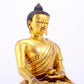 A majestic gilt bronze statue of Sakyamuni