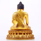 A majestic gilt bronze statue of Sakyamuni