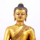 A majestic gilt bronze statue of Sakyamuni