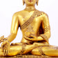 A majestic gilt bronze statue of Sakyamuni