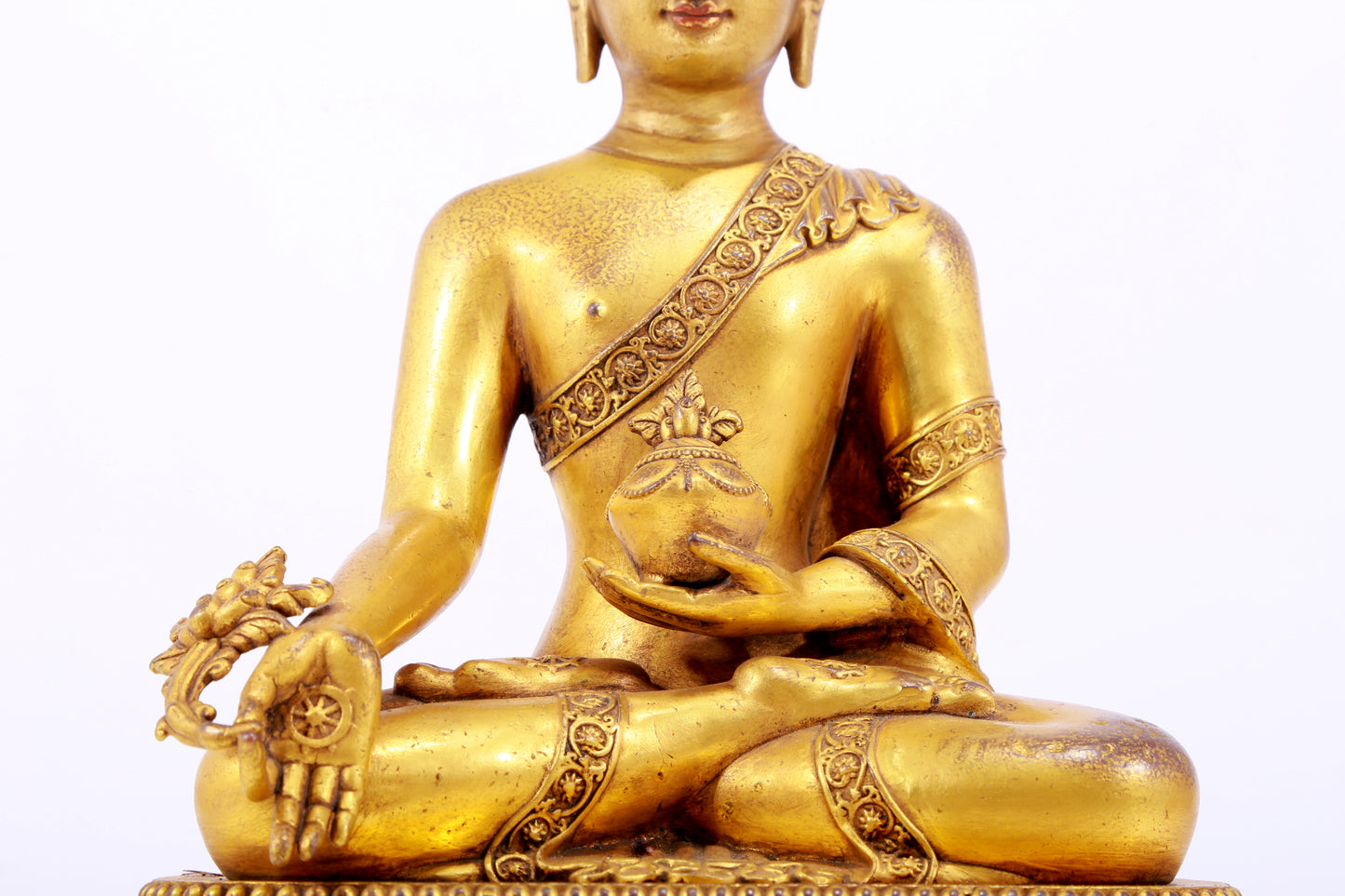 A majestic gilt bronze statue of Sakyamuni