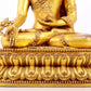 A majestic gilt bronze statue of Sakyamuni