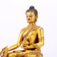 A majestic gilt bronze statue of Sakyamuni