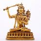 A majestic gilt bronze statue of Manjusri Bodhisattva